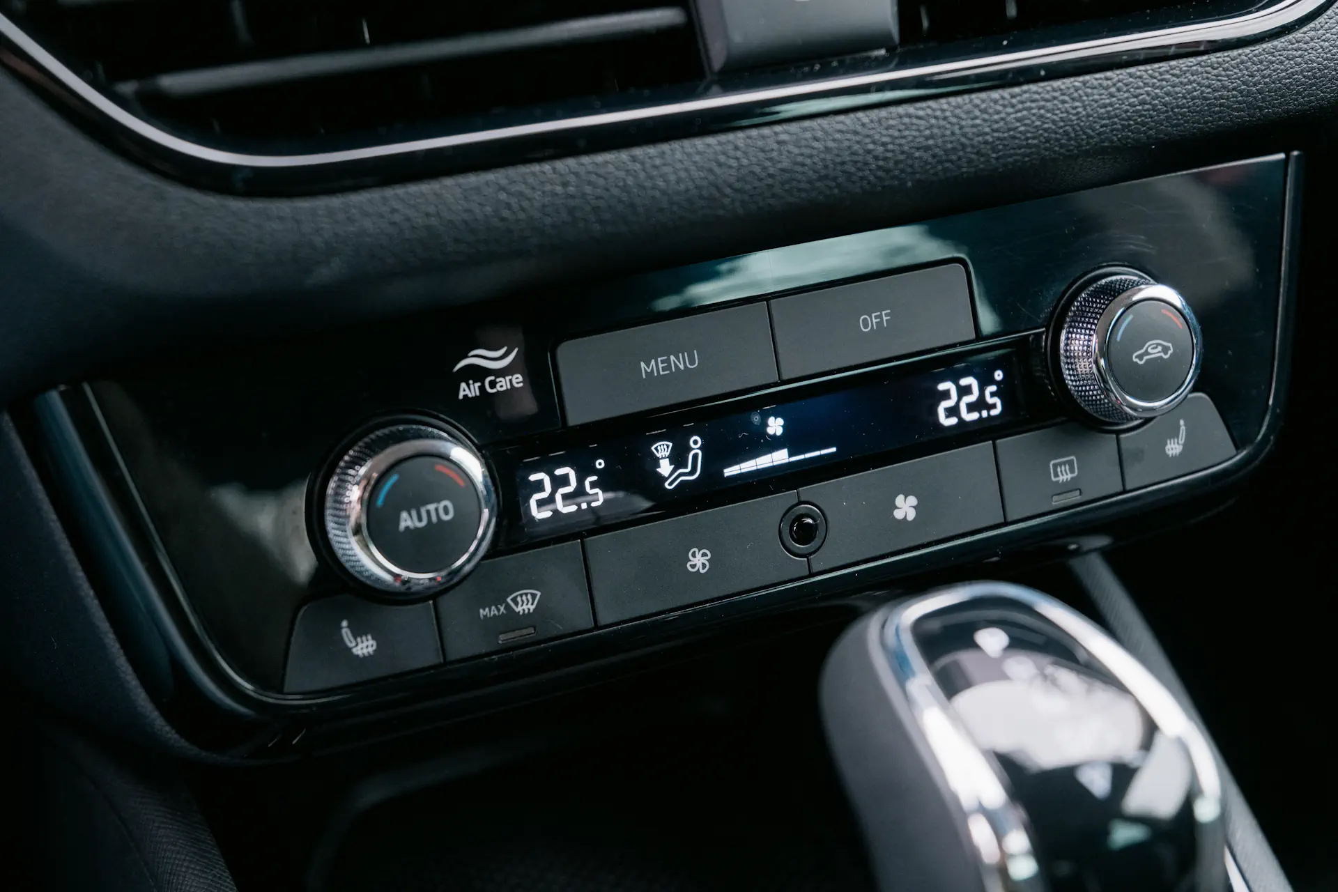 A modern car air con system on the dashboard