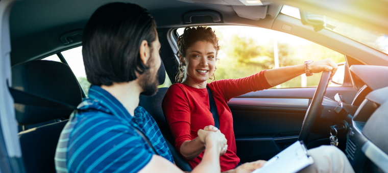 Driving instructor with student in a car
