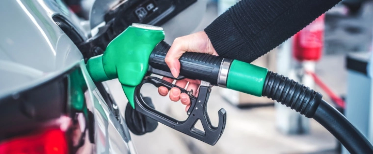 Driver using a petrol pump