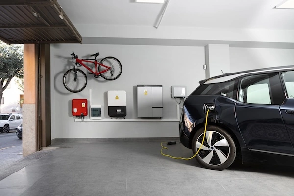 Electric car plugged in at a home ev charger