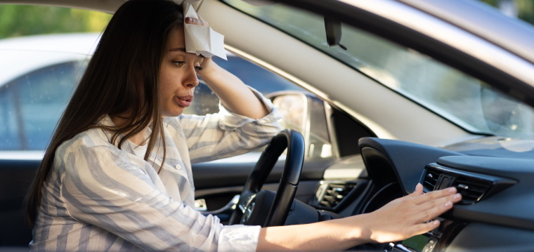 Driver too warm in the car adjusting the vents